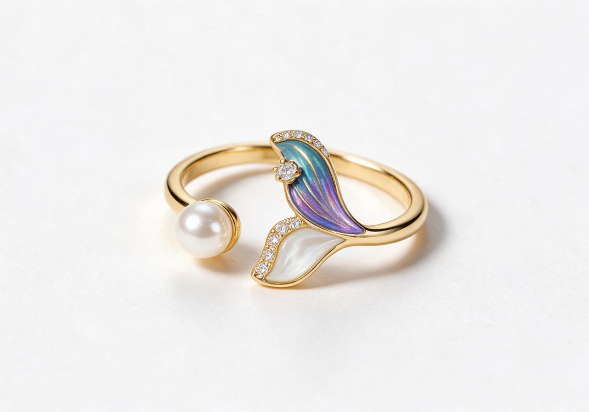 Gold-plated brass mermaid tail ring accented with a pearl and zirconia stones