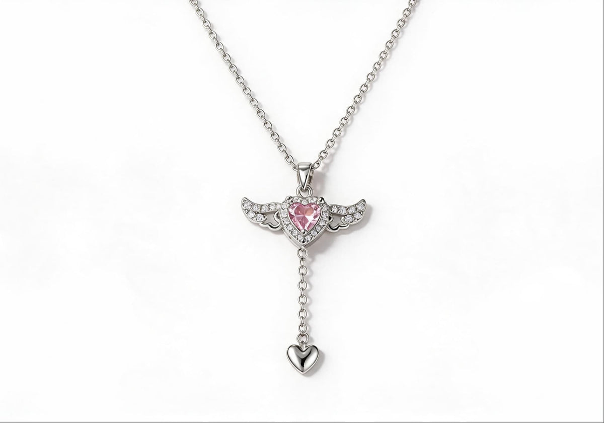 Silver winged heart pendant necklace with zirconia stones