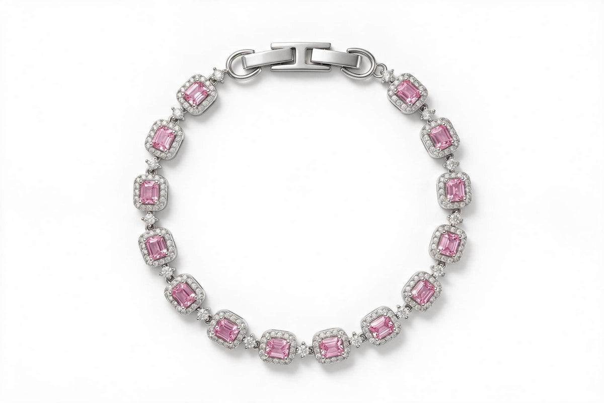 MAROVA JEWELS platinum-plated tennis bracelet lined with uniform emerald-cut pink cubic zirconia stones, each set in a sparkling cubic zirconia halo, completed with a smooth H-clasp, romantic luxury fashion jewelry presented on white backdrop