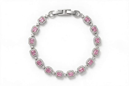 MAROVA JEWELS platinum-plated tennis bracelet lined with uniform emerald-cut pink cubic zirconia stones, each set in a sparkling cubic zirconia halo, completed with a smooth H-clasp, romantic luxury fashion jewelry presented on white backdrop