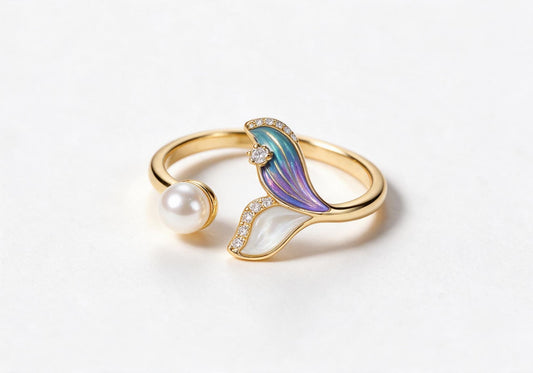 Gold-plated brass mermaid tail ring accented with a pearl and zirconia stones