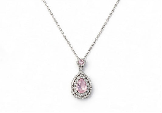 White gold-plated statement necklace featuring an oversized pink zirconia teardrop pendan
