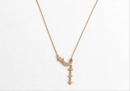 Gold-plated brass necklace featuring a celestial sun and moon design with zirconia stones