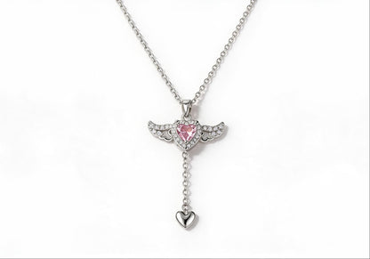 Silver winged heart pendant necklace with zirconia stones